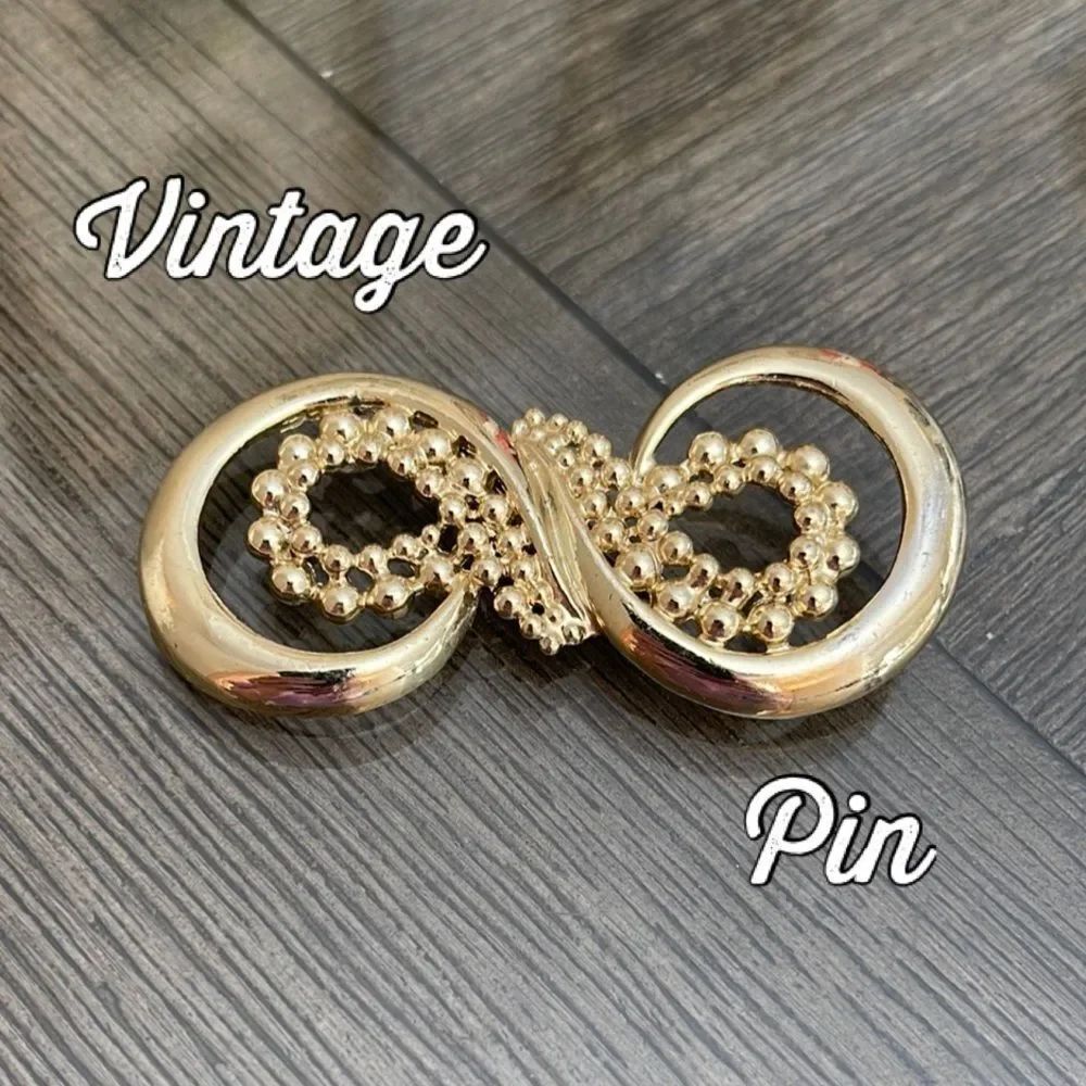 Vintage VAL Elegant Infinity Gold-tone Brooch